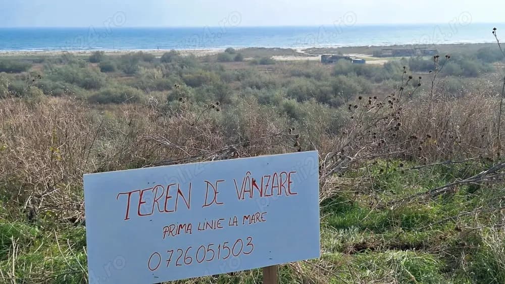 Vând schimb teren cu vedere la mare