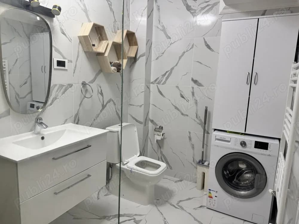 Ofer spre închiriere apartament 2 camere cu loc de parcare