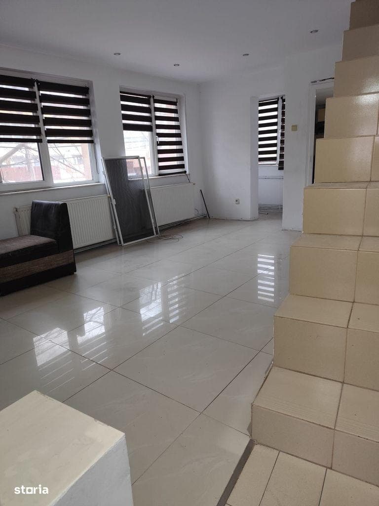 Proprietate imobiliara compusa din spatiu comercial si 2 studio-uri